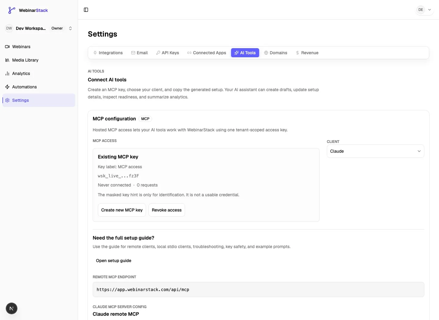 Settings AI Tools tab showing an existing MCP key, Claude client selection, the remote MCP endpoint, and the generated Claude MCP server config