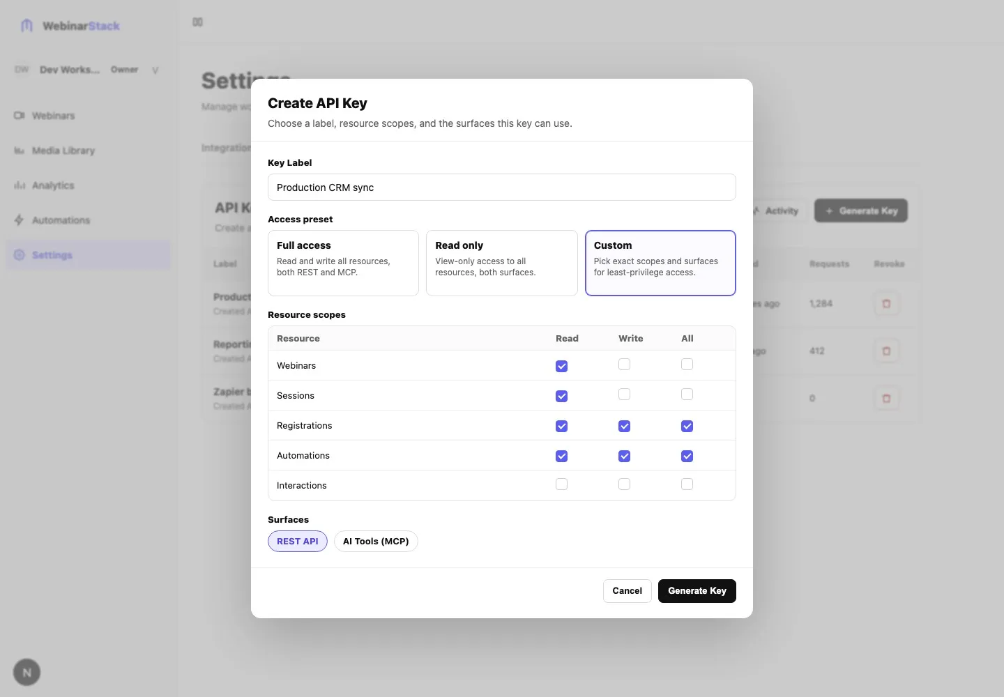 Create API Key dialog showing the key label field, access presets, custom resource scopes, surface choices, and Generate Key button